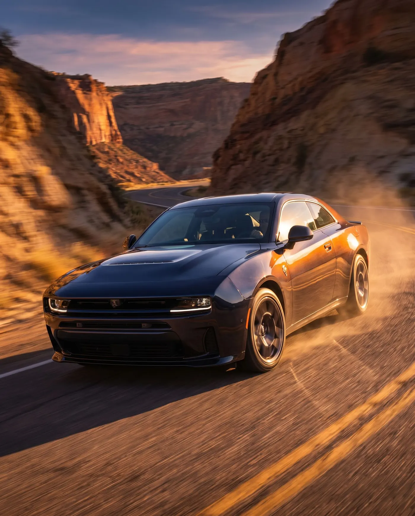 Dodge Charger Scat Pack on a canyon road at golden hour